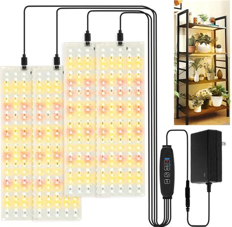 Moderný LED grow panel nad rastlinami konopy