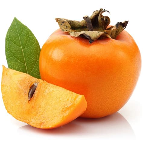 Oranžové zrelé ovocie hurmikaki na tanieri