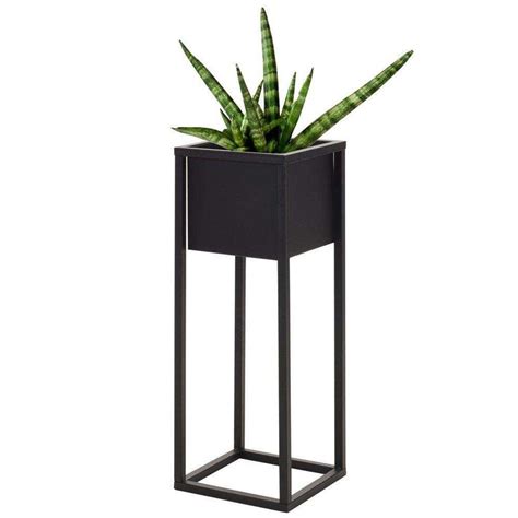 Tematické foto: moderný čierny hranatý kvetináč 41x41 cm v interiéri s rastlinou