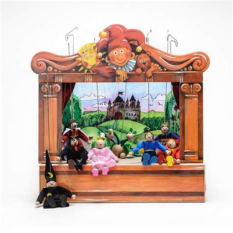 Ilustrácia bábkového divadla s rôznymi bábkami.