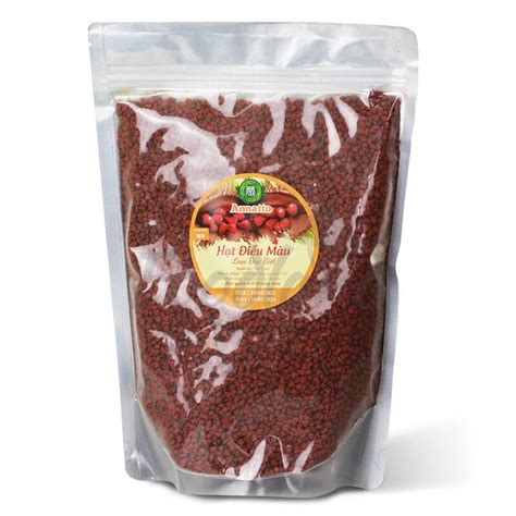 Annatto semienka a annatto olej v miske