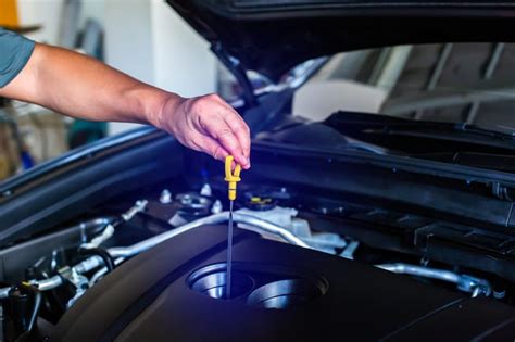 Schéma znázorňujúca hladinu oleja na mierke motora