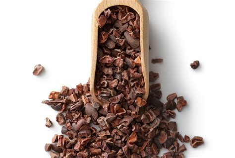 Kakaové bôby sušiace sa na slnku na bambusových rohožiach